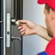 Residential locksmith unlocking a door